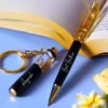 “Personalized gold flake pen and keychain set with name engraved, packed in a premium gift box – perfect for birthdays, corporate or personal gifting.”