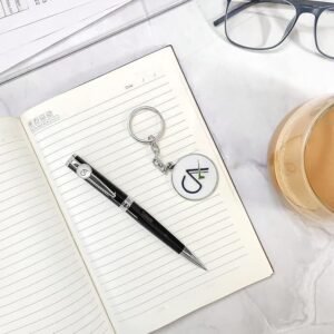 Personalized black and silver pen and keychain gift set for Chartered Accountants with engraved name and CA logo, presented in a premium gift box – ideal professional gift.
