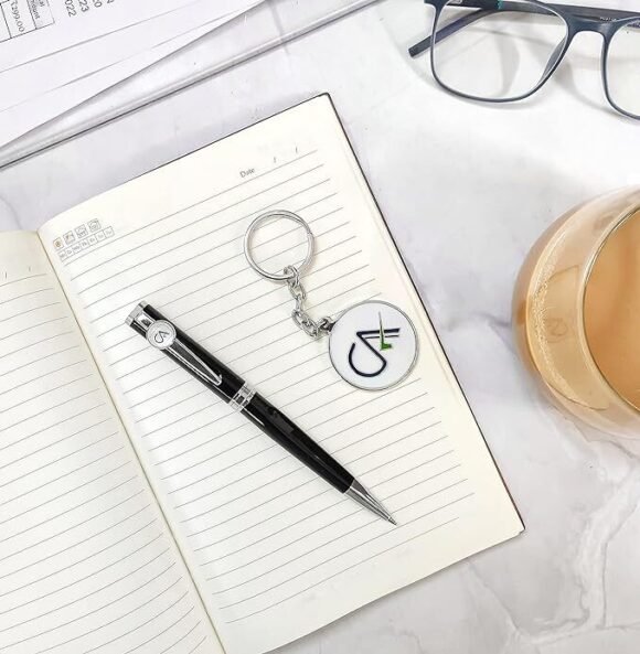 Personalized black and silver pen and keychain gift set for Chartered Accountants with engraved name and CA logo, presented in a premium gift box – ideal professional gift.