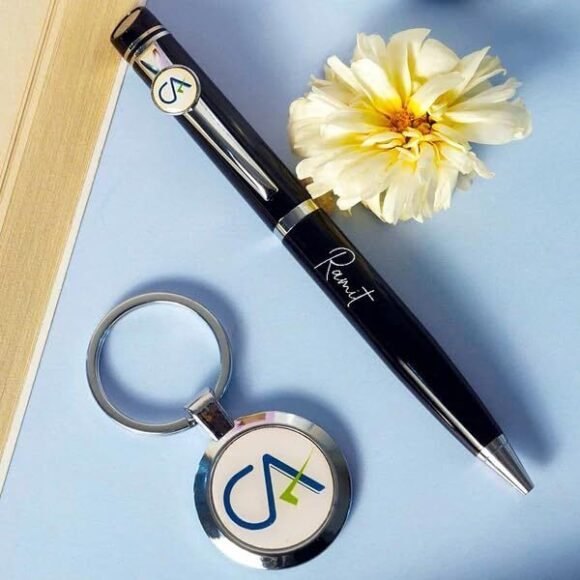 Personalized black and silver pen and keychain gift set for Chartered Accountants with engraved name and CA logo, presented in a premium gift box – ideal professional gift.