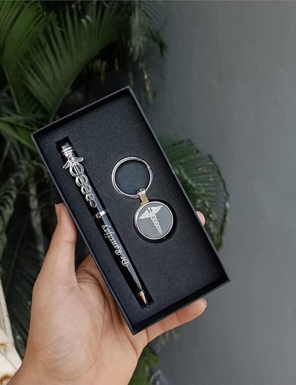 Personalized black and silver pen and keychain gift set for doctors, engraved with name and medical logo, elegant metal finish, packed in a premium gift box.