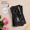 Black and silver personalized pen and keychain set for lawyers or advocates, engraved with name and legal logo, presented in an elegant gift box