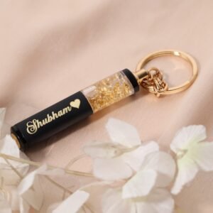 “Premium personalized metal pen with gold flakes, engraved with name, ideal corporate or personal gift for birthdays, graduations, weddings, and professionals like doctors or lawyers.”