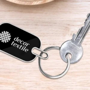 “Personalized oval metal keychain with laser-engraved name or logo, durable finish – ideal for gifting, branding, and professional use.”