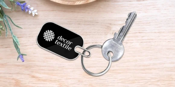 “Personalized oval metal keychain with laser-engraved name or logo, durable finish – ideal for gifting, branding, and professional use.”