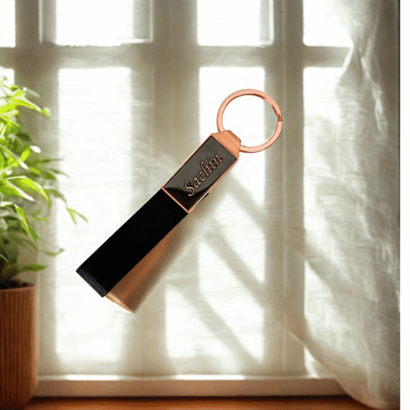 “Luxury matte black and rose gold pen and keychain gift set in premium grey presentation box – elegant gift for professionals or corporate use.”