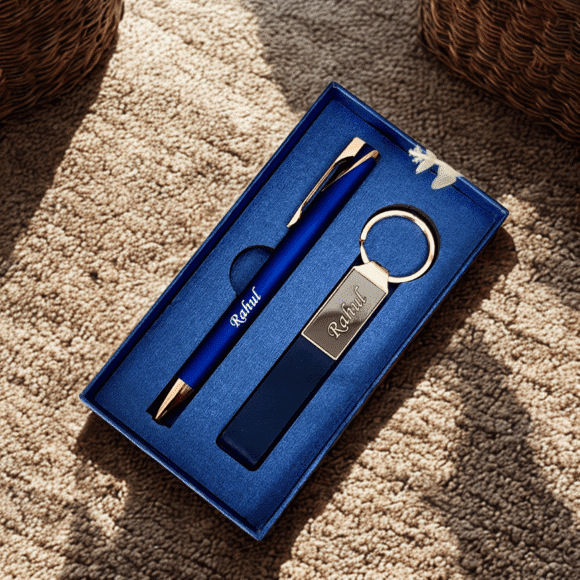 “Luxury matte black and rose gold pen and keychain gift set in premium grey presentation box – elegant gift for professionals or corporate use.”