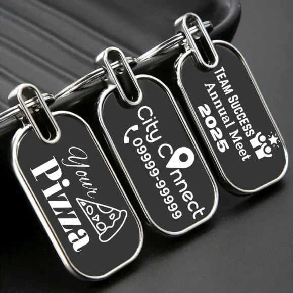 “Personalized oval metal keychain with custom name or logo engraving, ideal for professional branding or corporate gifting.”