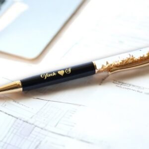 Personalized black and gold metal pen with gold flakes, name engraved, soft grip, medium point, and blue ink – elegant gift for professionals or personal use.