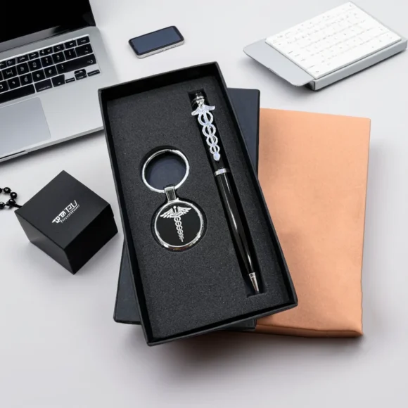 Personalized black and silver pen and keychain gift set for doctors, engraved with name and medical logo, elegant metal finish, packed in a premium gift box.